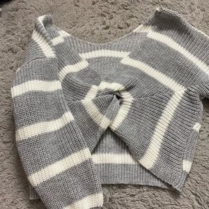 not in the front, cute sweater